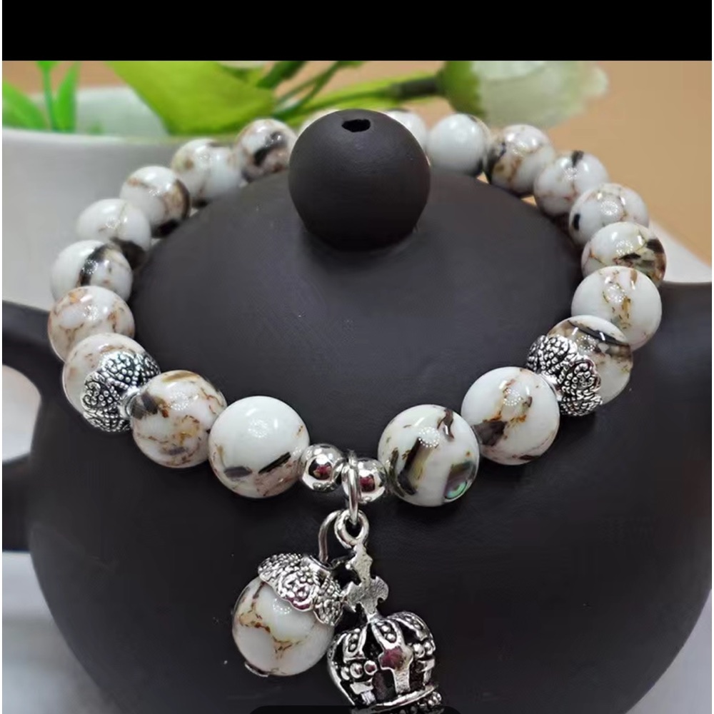 White marble bracelet with crown